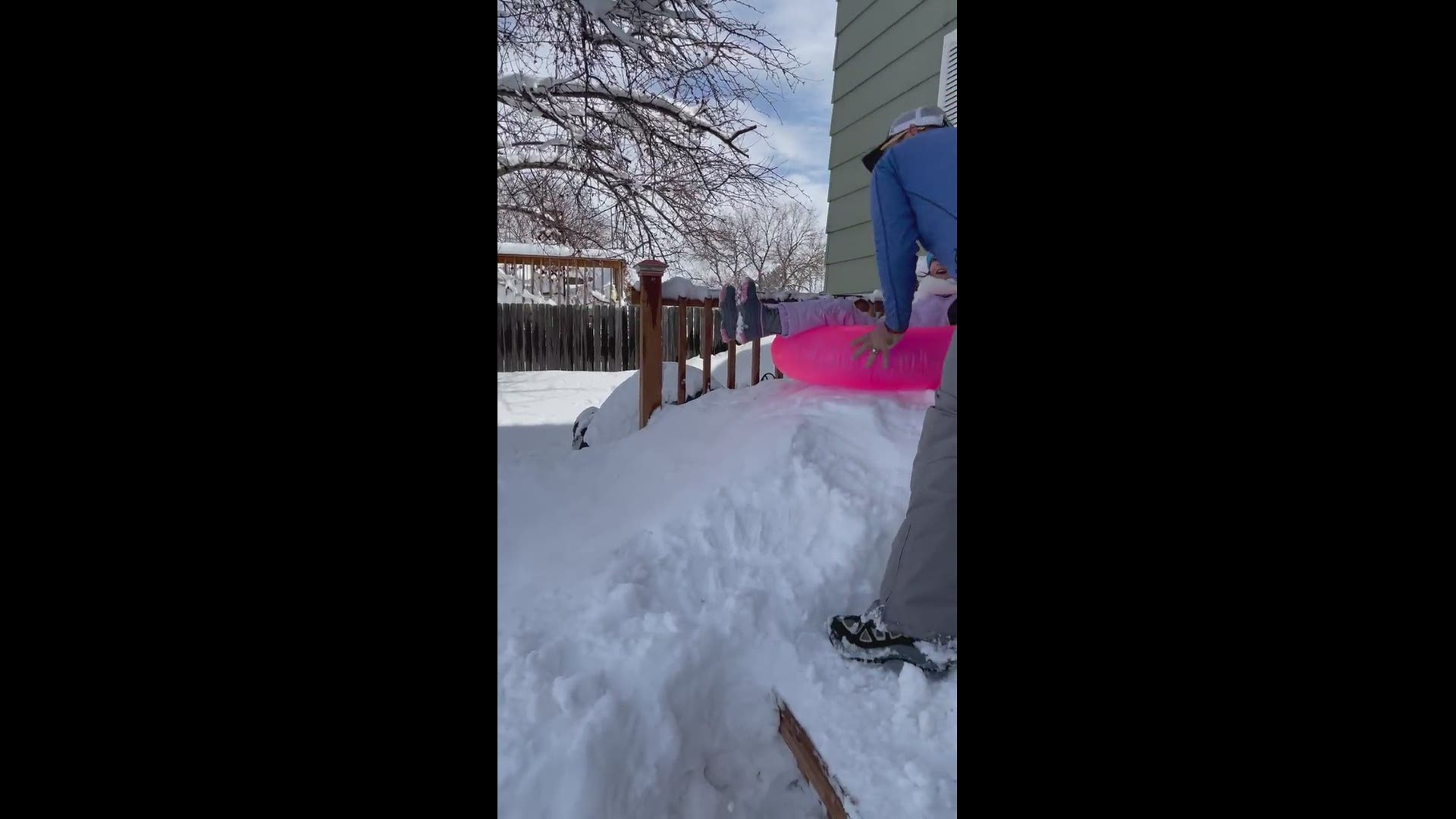 Snow day fun! No need to go anywhere when dad builds a tubing hill in your front yard!
Credit: Hillary Osmack