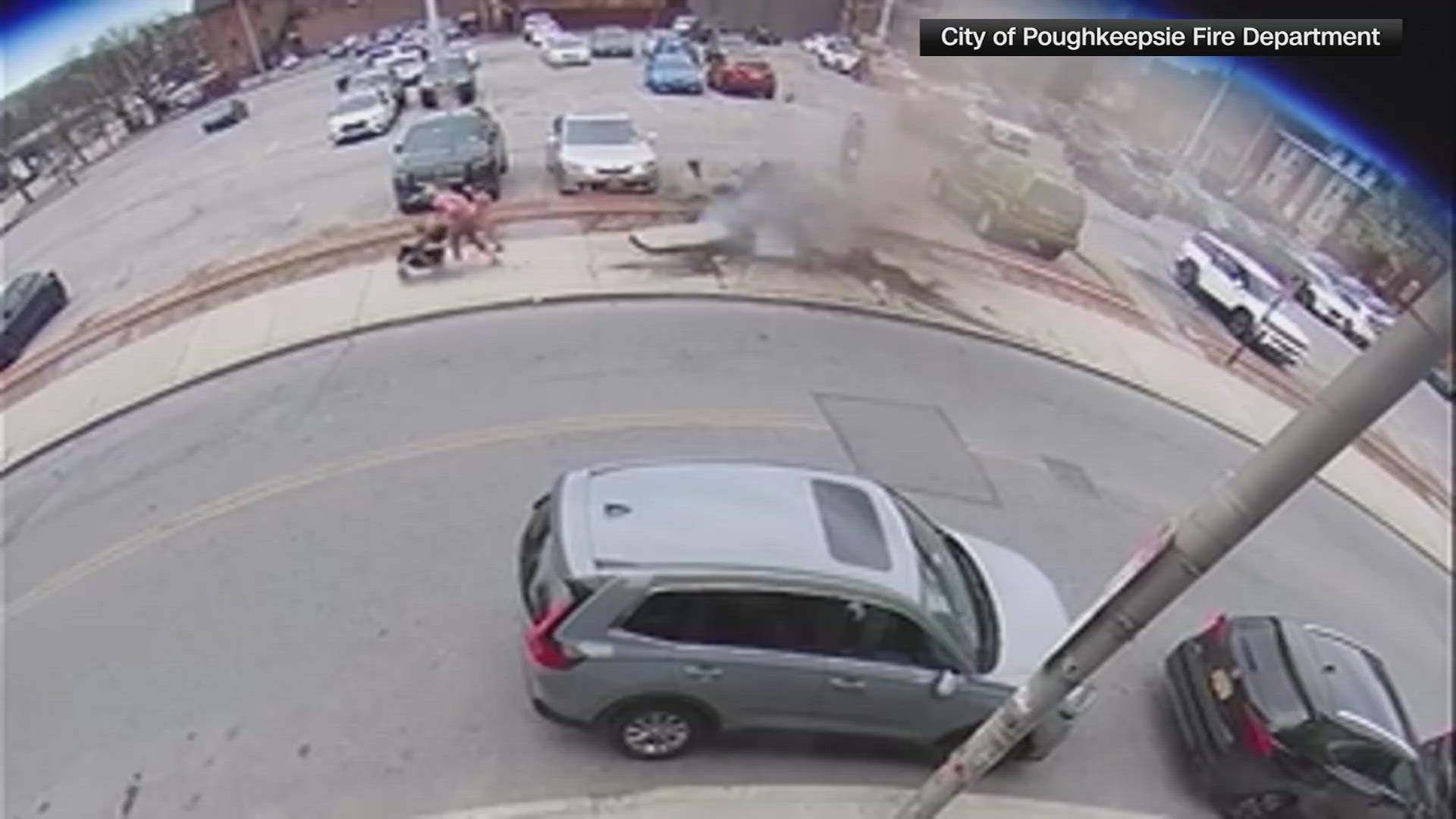 The manhole exploded just seconds after a woman pushing a stroller stepped over it. 