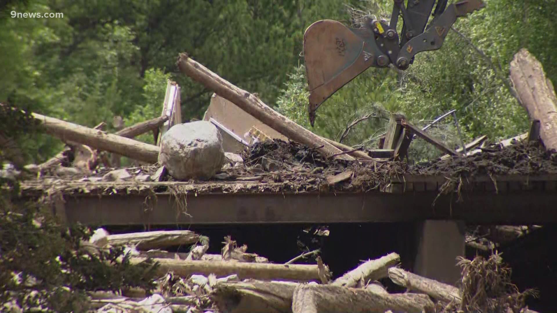 At least five structures were destroyed and Highway 14 was damaged.