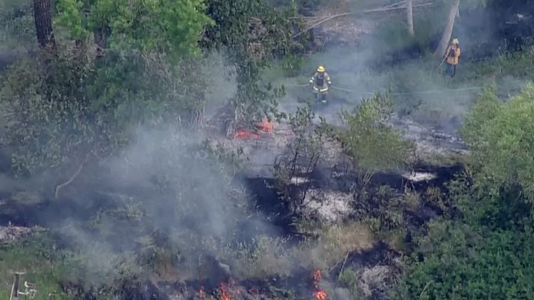 Crews contain vegetation fire in Arvada | 9news.com