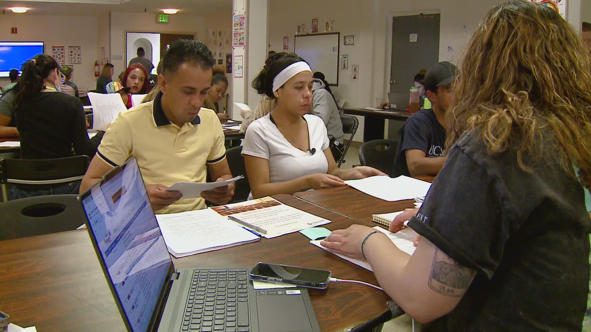 The program has officially started enrolling migrants and connecting them to resources like job skills program and help with their asylum application.