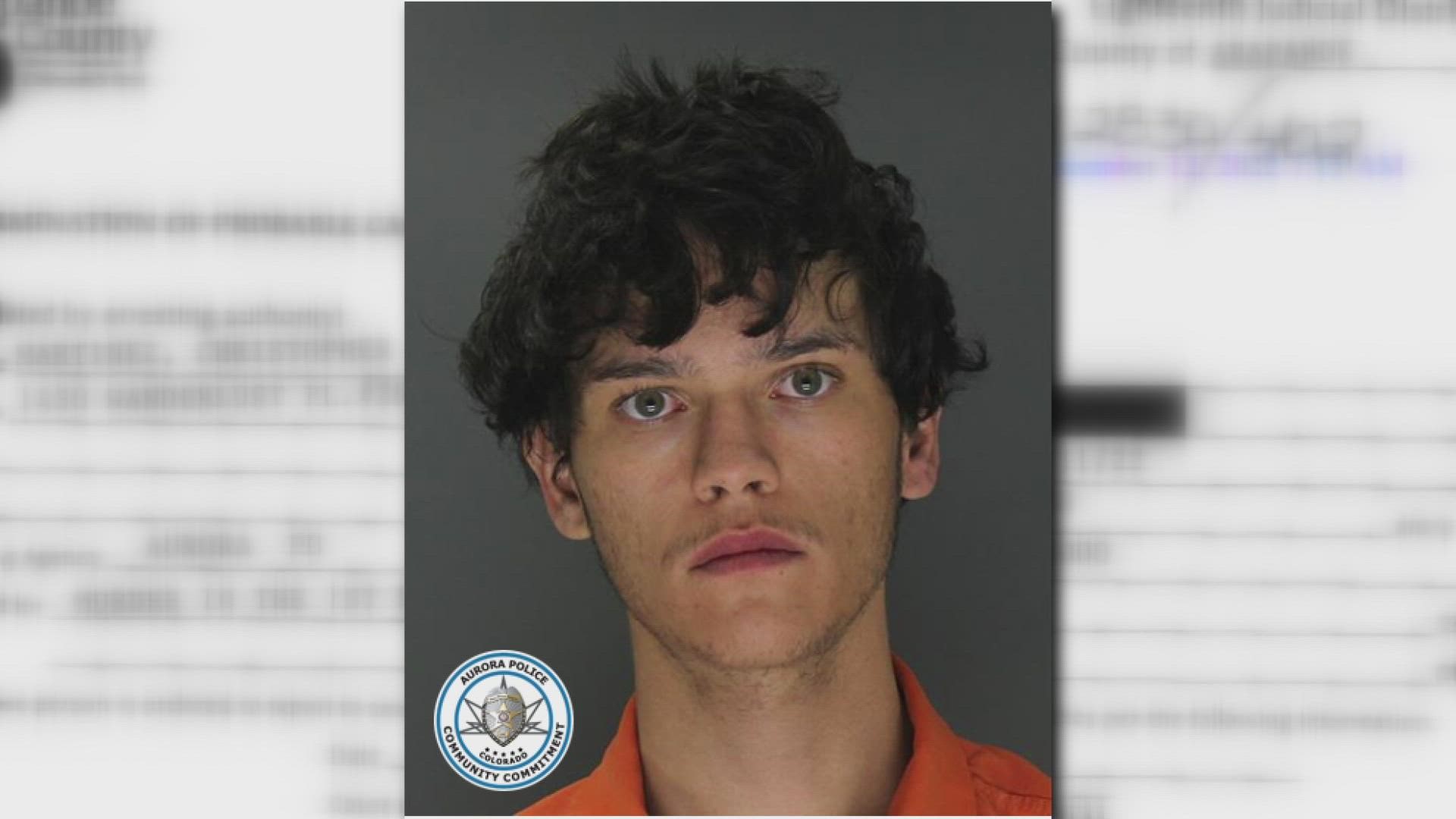 Christopher Martinez, 21, is accused of killing three people inside an Aurora home Friday night.