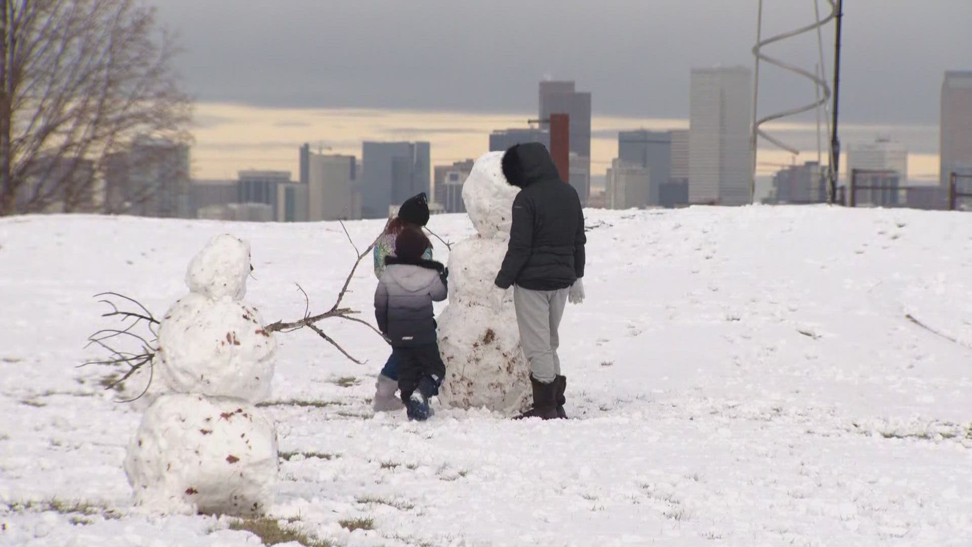 Families were out all day enjoying the unexpected snow that fell in Colorado.