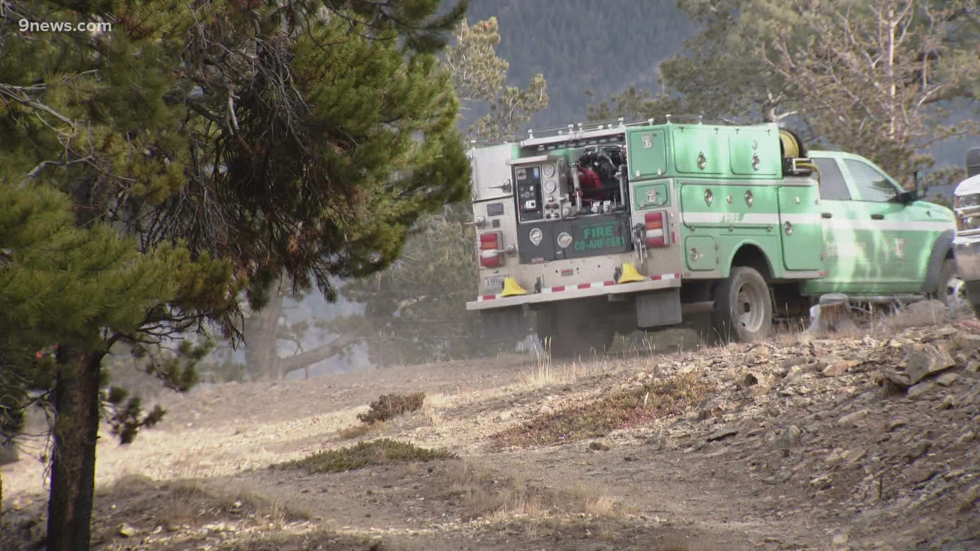 The Miners Candle Fire west of Idaho Springs is 50% contained. Evacuation orders were lifted Monday morning.
