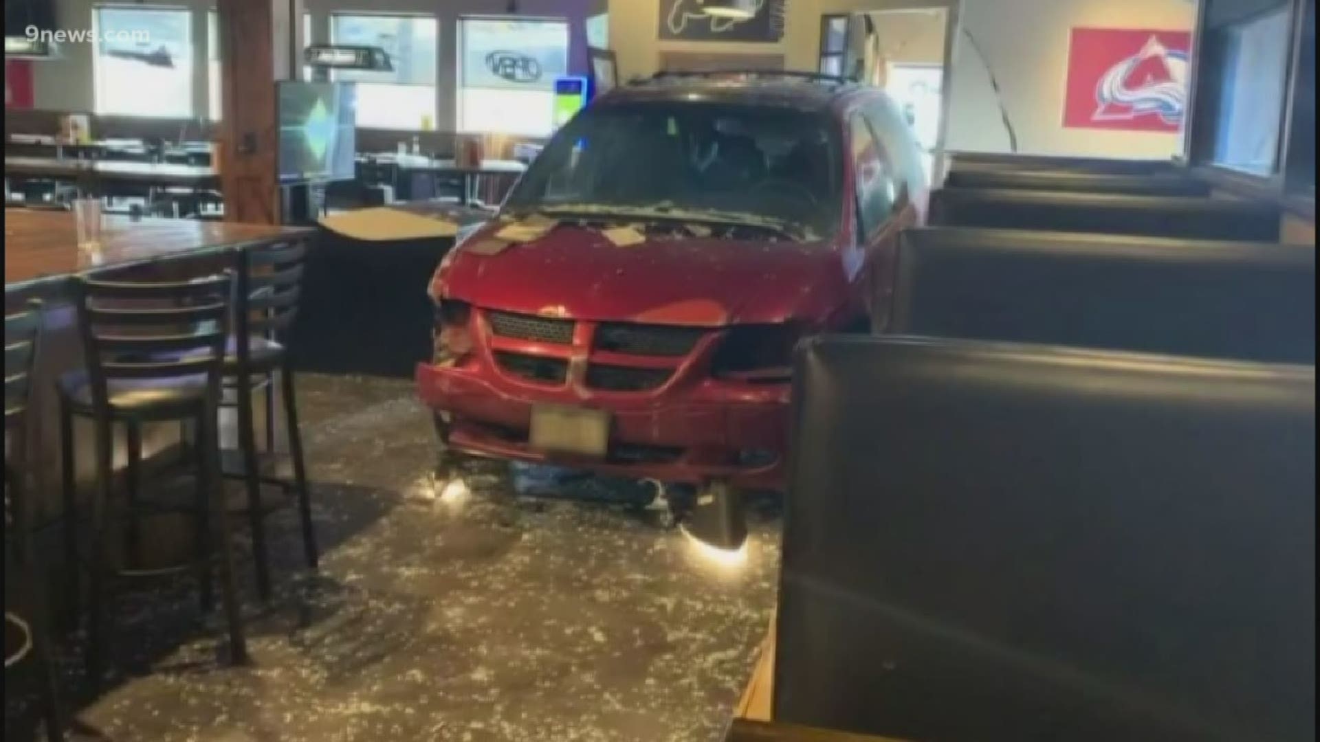 Two men slammed a stolen minivan into a Littleton business early Monday morning in an effort to burglarize it, according to police.