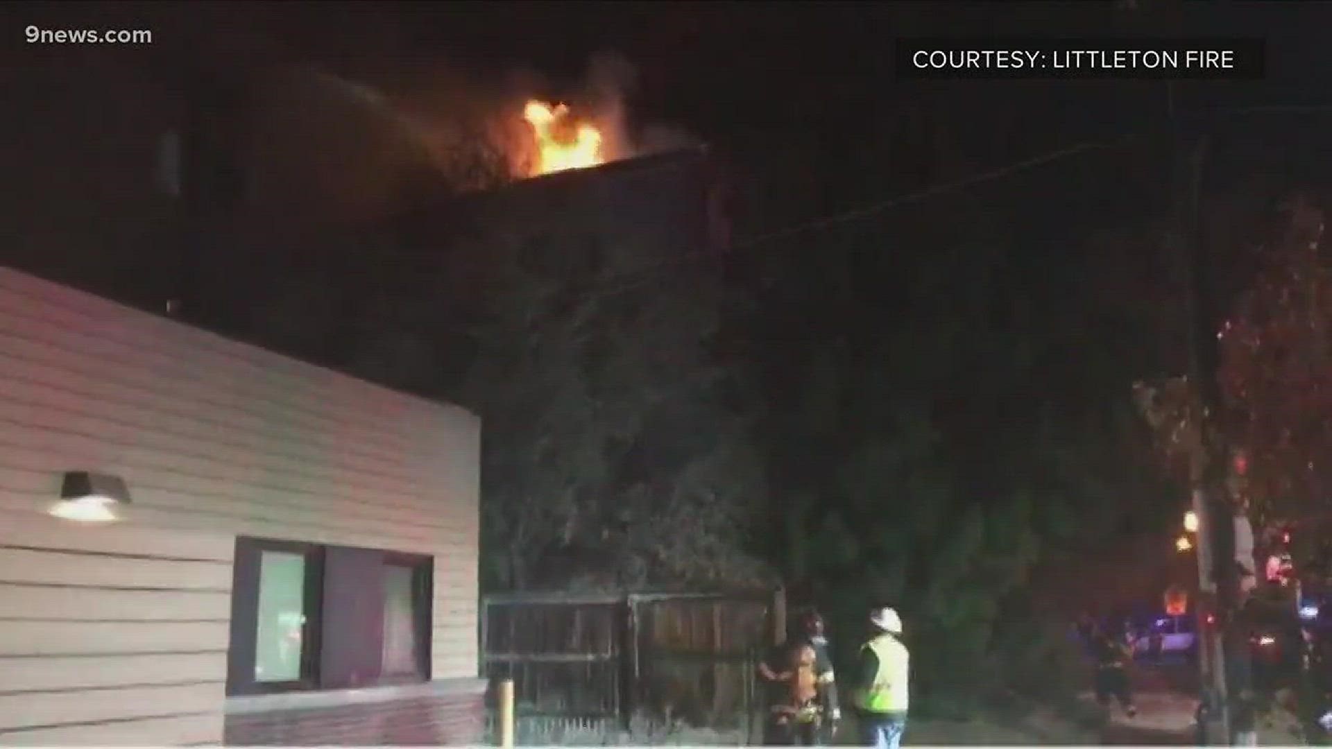 Fire ripped through a three-story apartment complex in Littleton damaging 18 units.