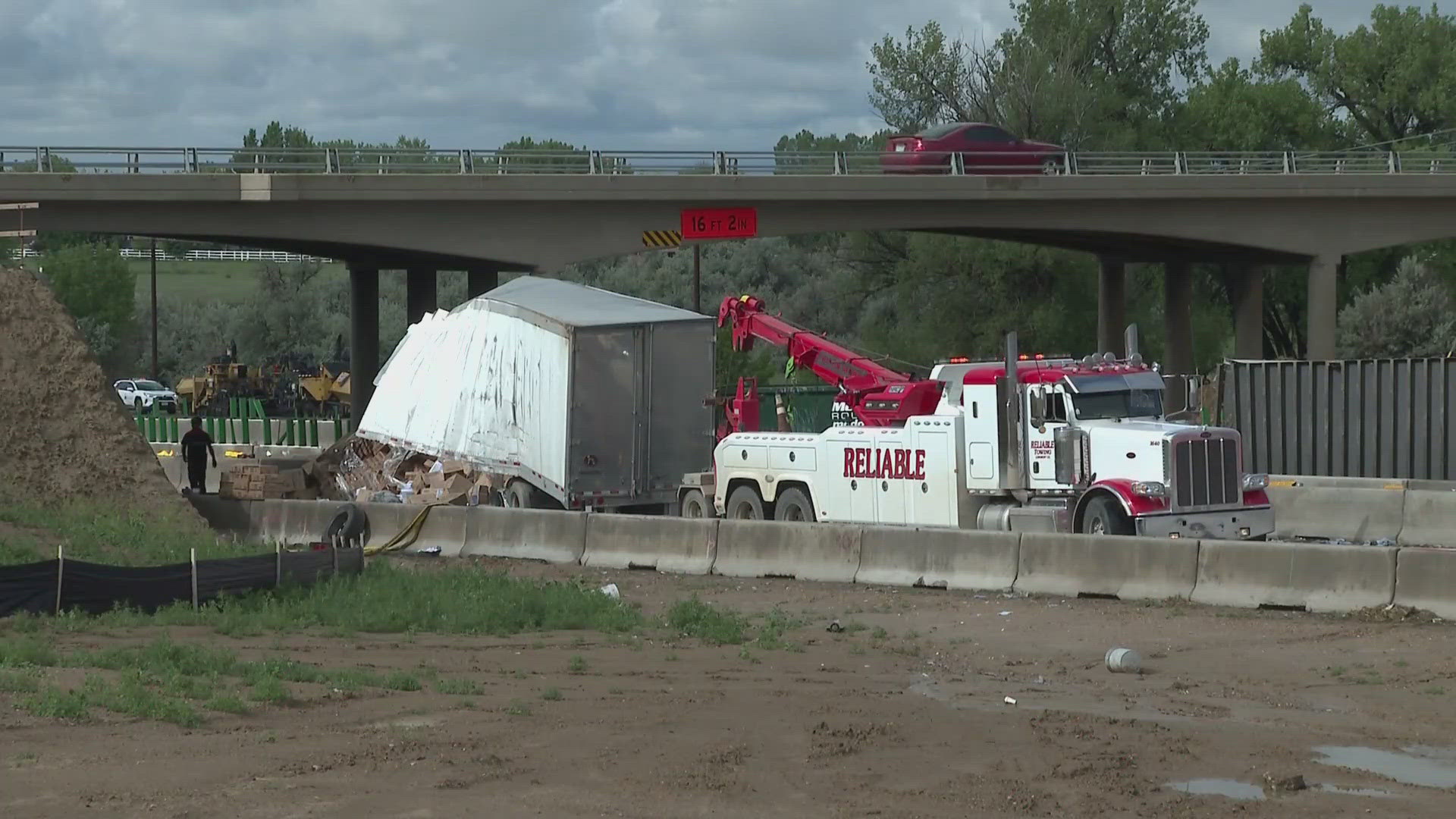 Crews are working to clean up the debris before reopening the road.