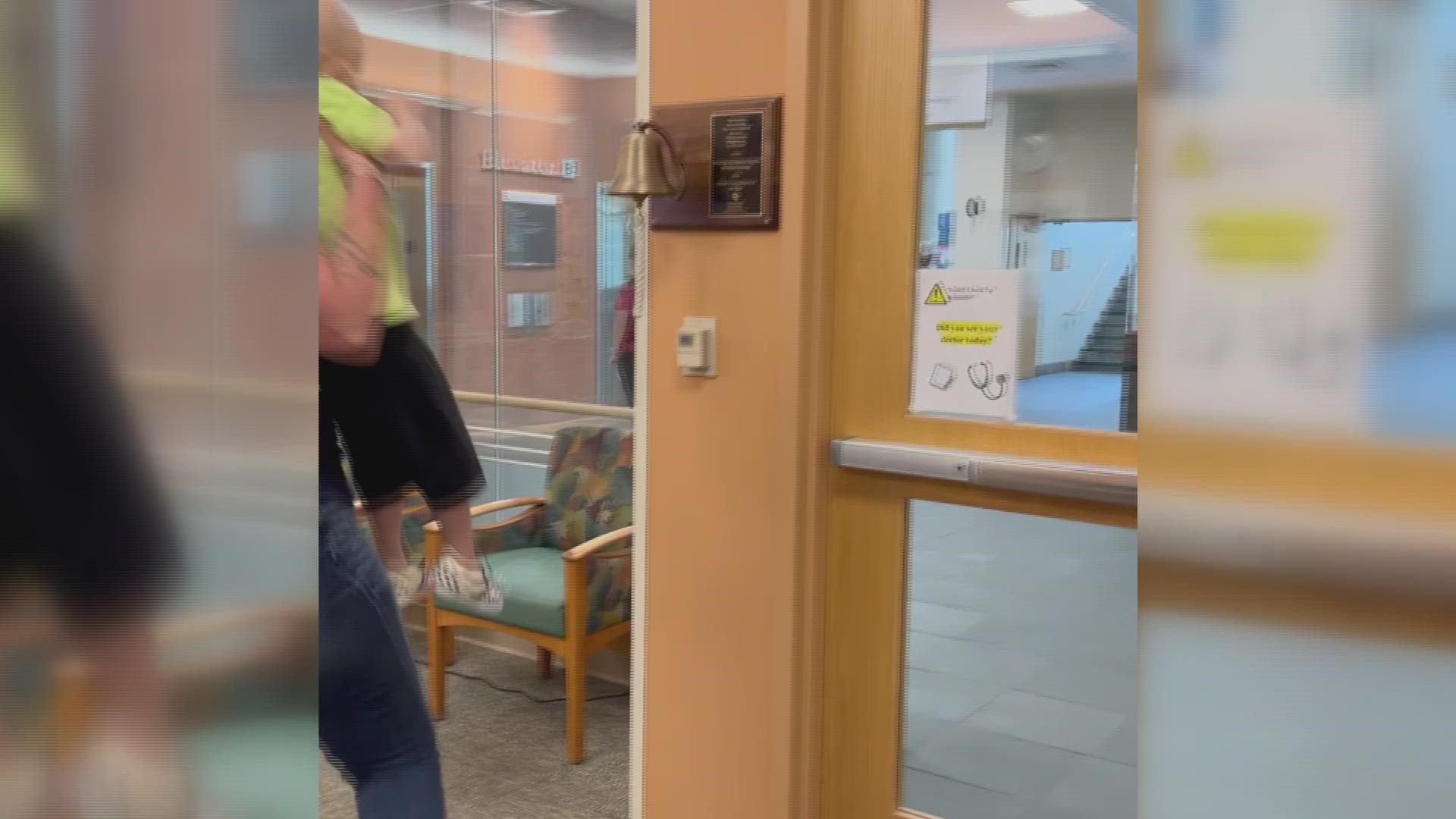 Three-year-old Bodie celebrates his last chemotherapy treatment and rings the bell.