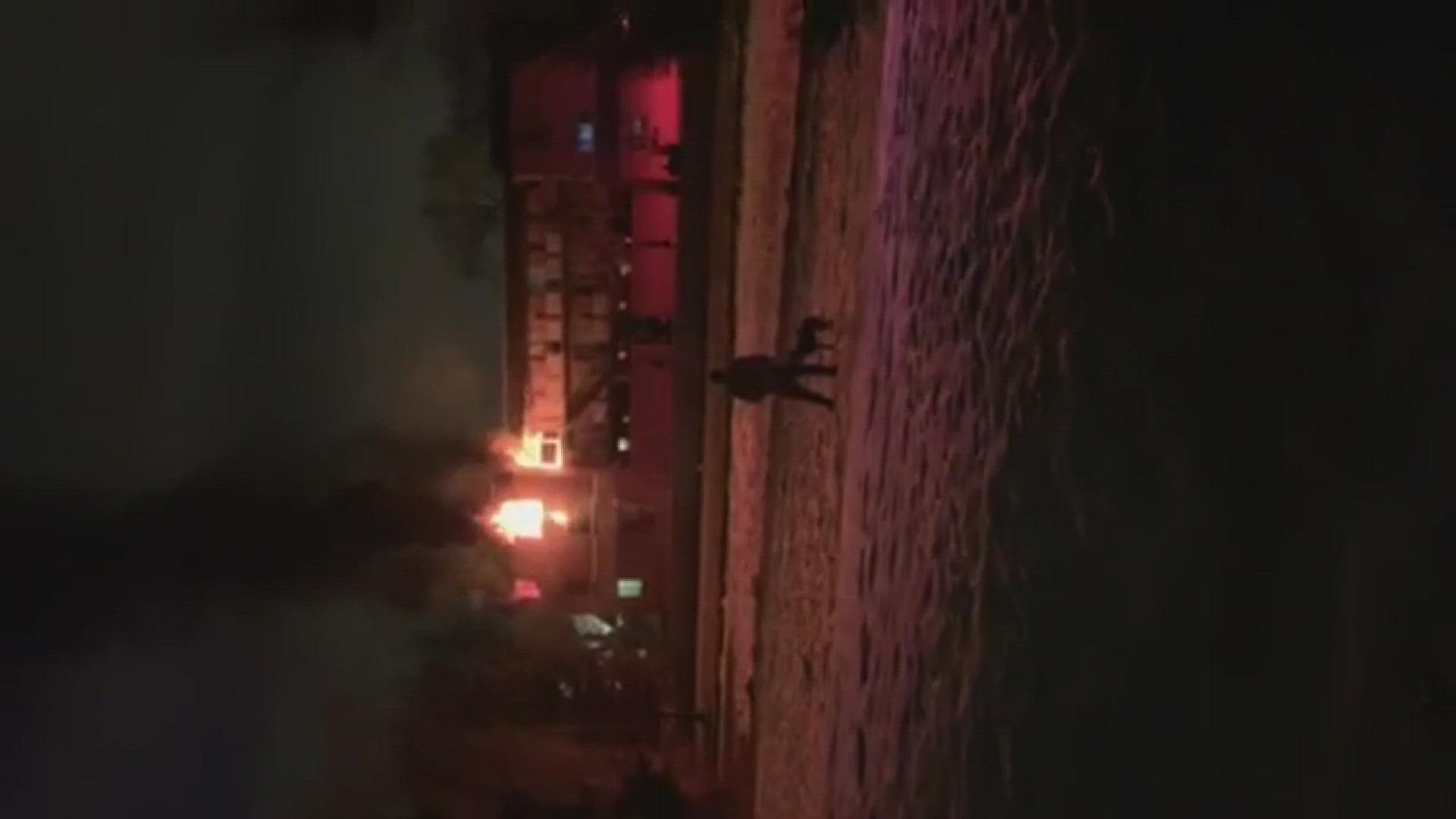 Denver firefighters say at least one person was hurt in an apartment fire Thursday night in Denver's University neighborhood. Video courtesy Meredith Olson.