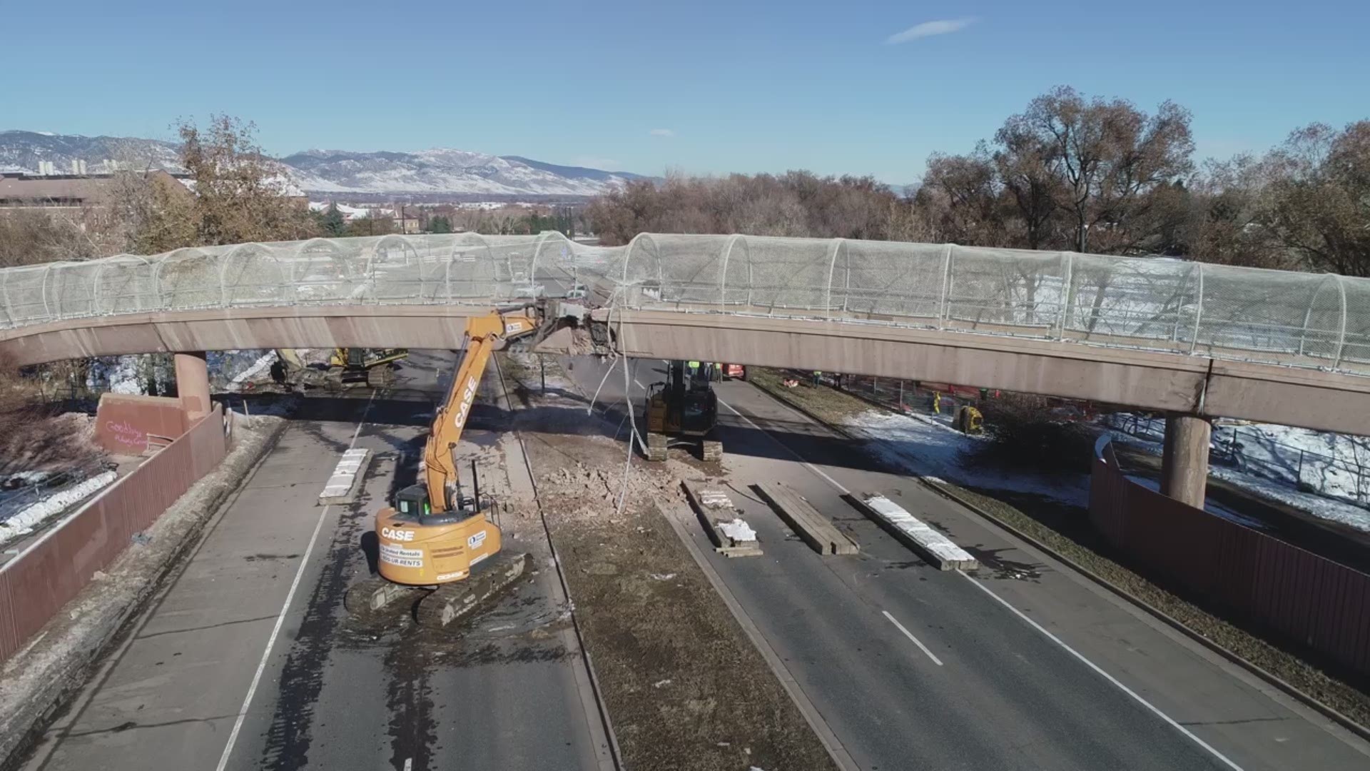 Crews in Boulder removed an aging pedestrian bridge over Foothills Parkway on Saturday, Nov. 2, 2019.