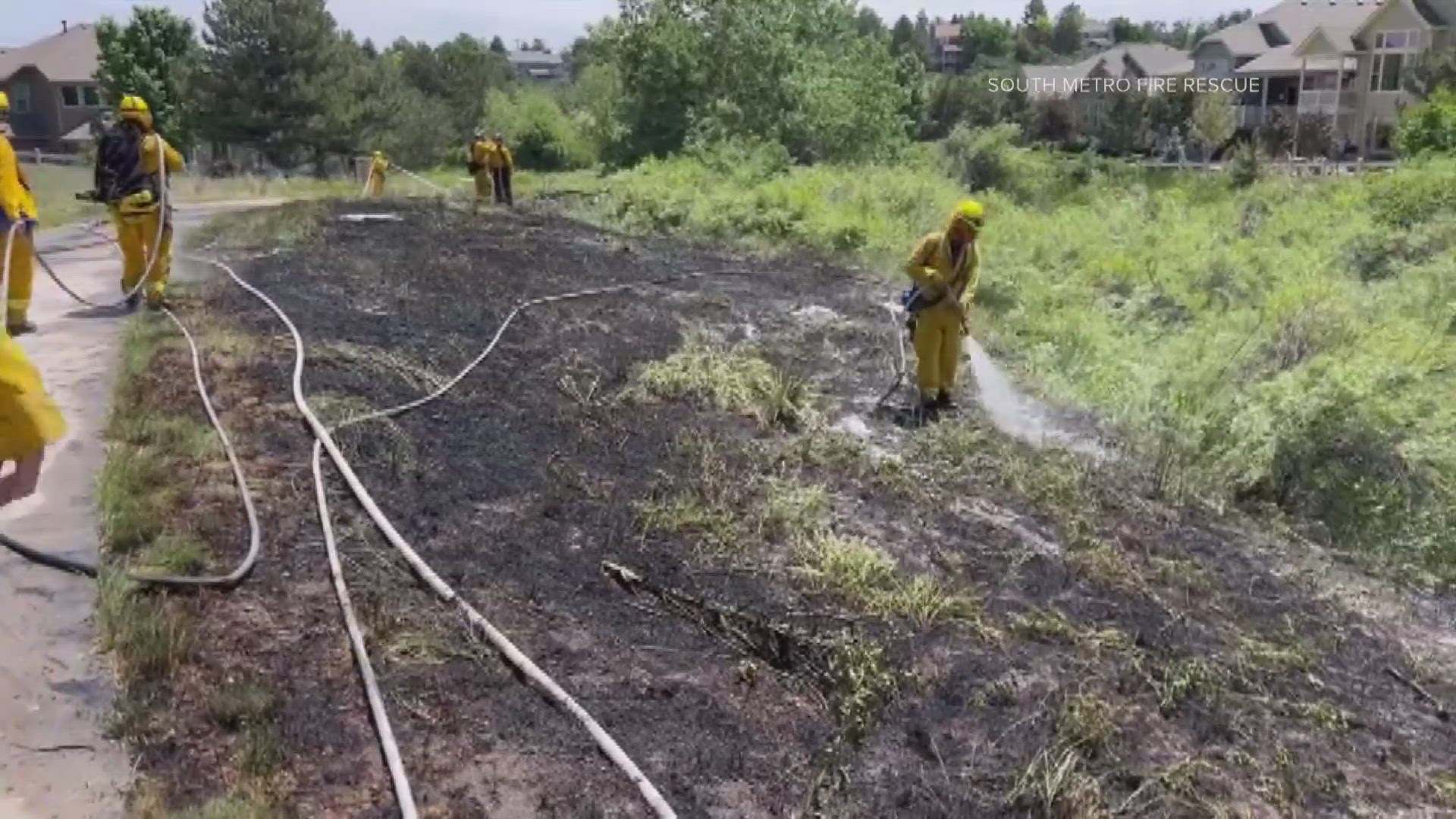 The brush fire burned 1 1/2 acres Tuesday near Bristolwood Lane and Monarch Boulevard in Castle Pines, Colorado. A juvenile is suspected of starting the fire.