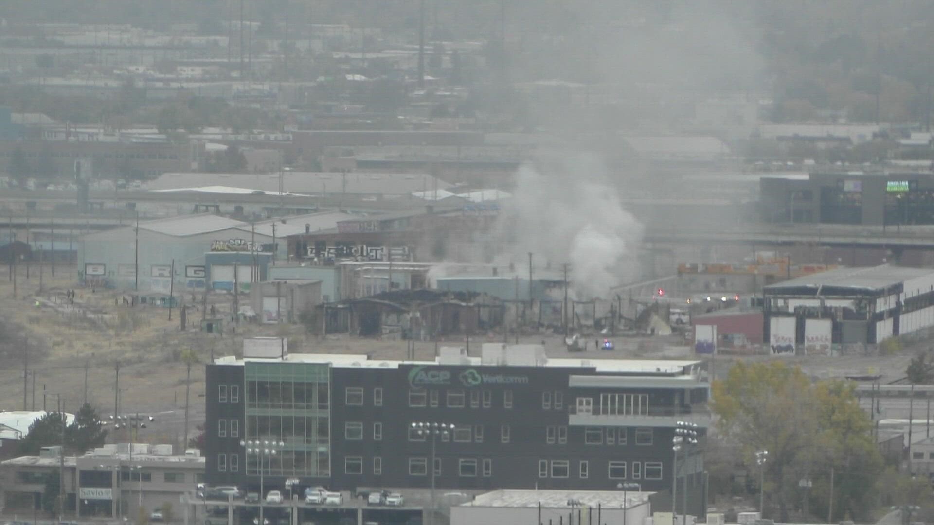 Denver firefighters responded to a fire in a commercial building near a central Denver rail yard Monday afternoon.