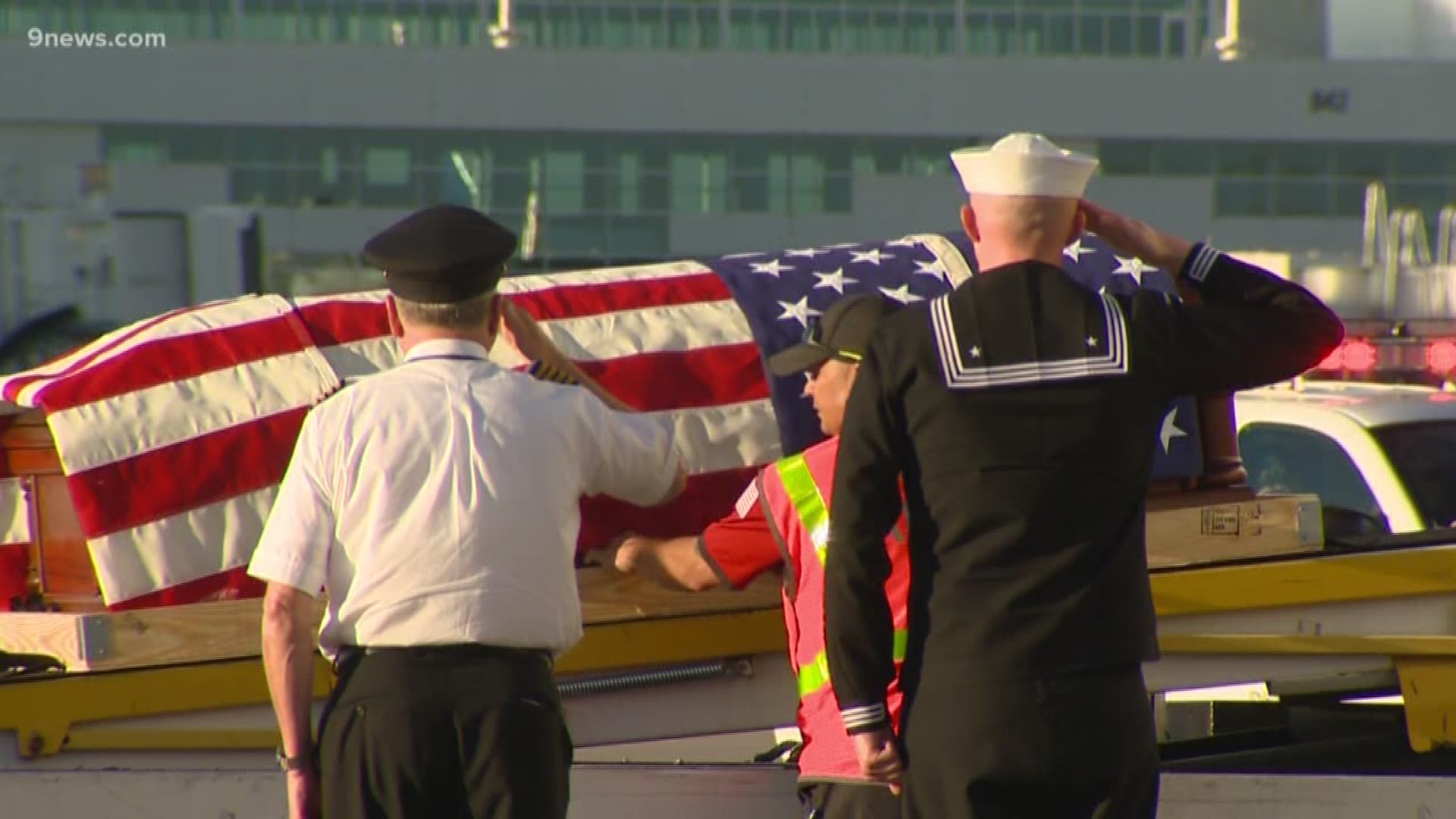 George Hanson was killed during the attack on Pearl Harbor in 1941. A procession greeted his remains at DIA Wednesday night.