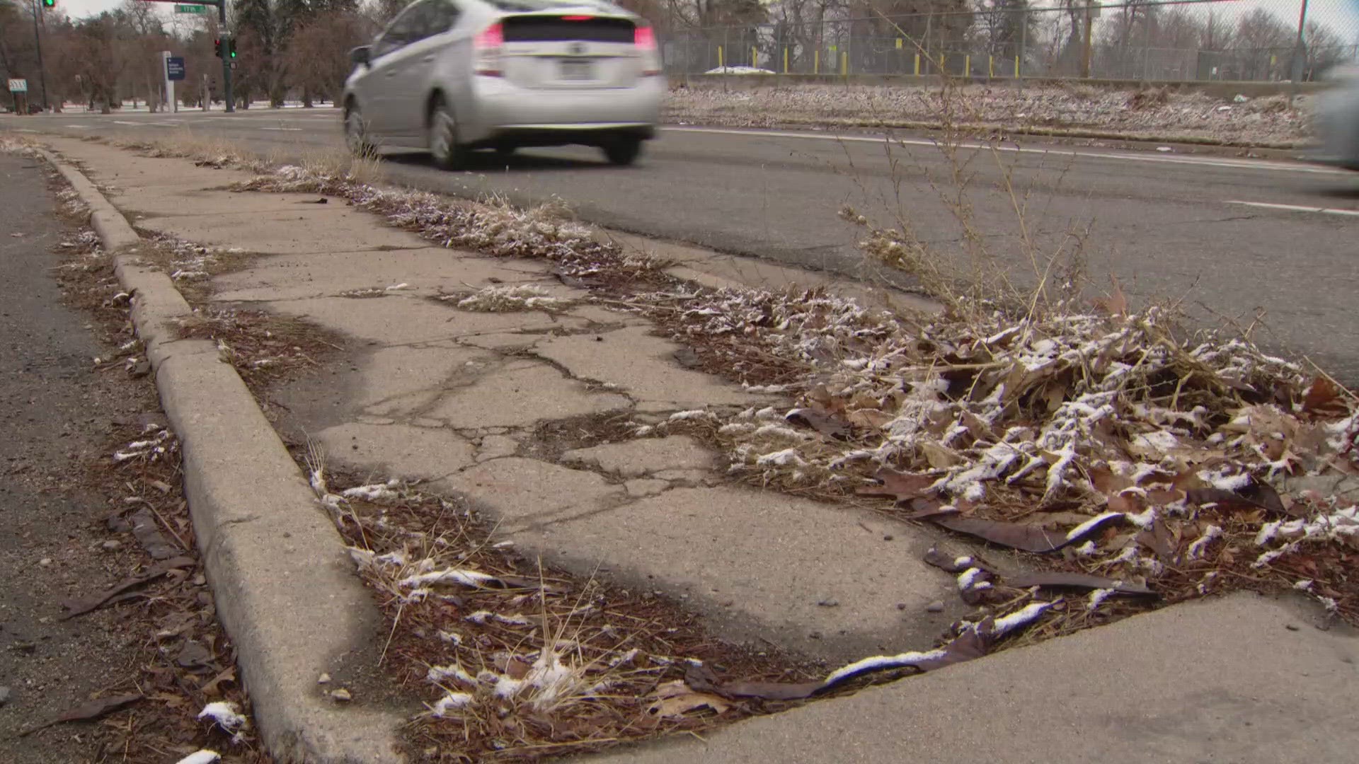 A city committee is changing its proposal regarding how much property owners will pay for sidewalk repairs.