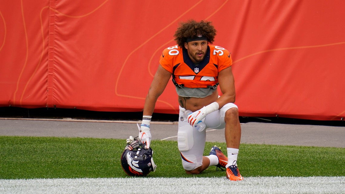 November 03, 2019: Denver Broncos running back Phillip Lindsay (30) is  congratulated during a timeout after his 16-yard sealed the win at the end  of the second half of the game between