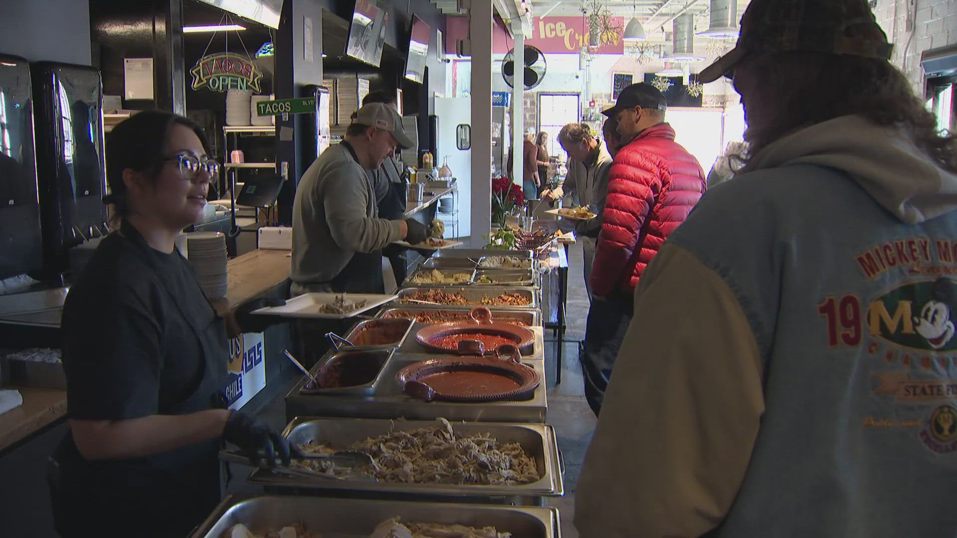 Chefs prepared traditional Thanksgiving food with a Mexican twist, including a turkey mole.