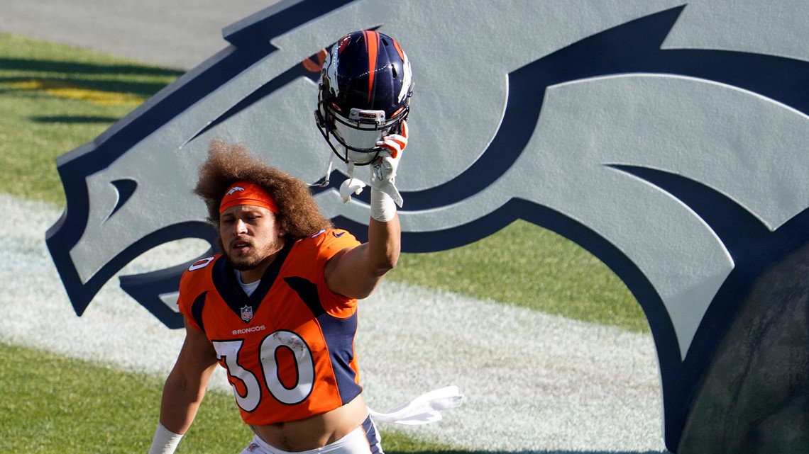 November 03, 2019: Denver Broncos running back Phillip Lindsay (30) is  congratulated during a timeout after his 16-yard sealed the win at the end  of the second half of the game between