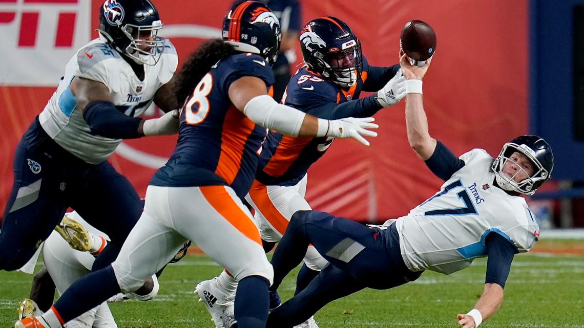 Denver Broncos defensive lineman Jonathan Harris (92) plays against the  Tennessee Titans during the first half of an NFL football game Sunday, Nov.  13, 2022, in Nashville, Tenn. (AP Photo/Mark Zaleski Stock