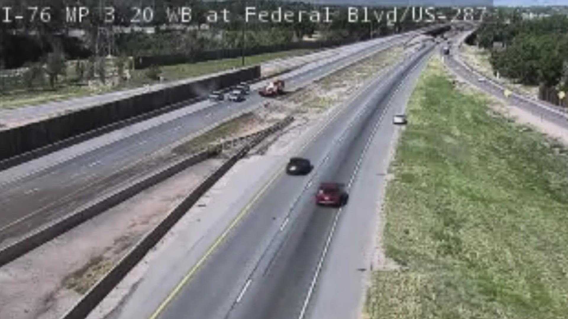 CDOT cameras showed eastbound lanes were back open around 11:45 a.m. on Sunday.