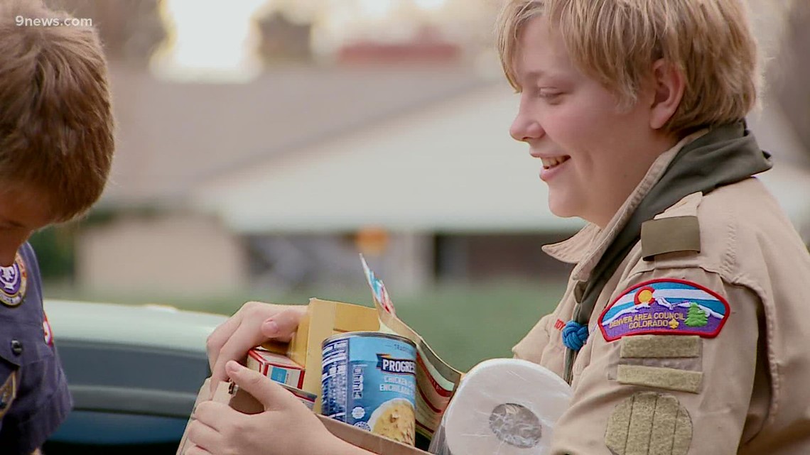 Boy Scouts help give back by collecting food for shelters