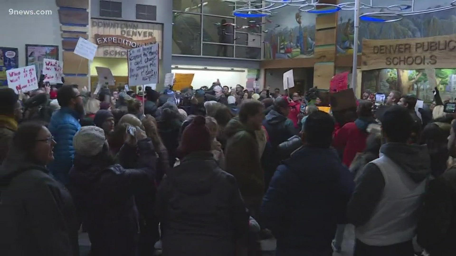 Teachers rallied outside district headquarters Thursday night, while the school board met inside, listening to teachers and parents talk about the strike.