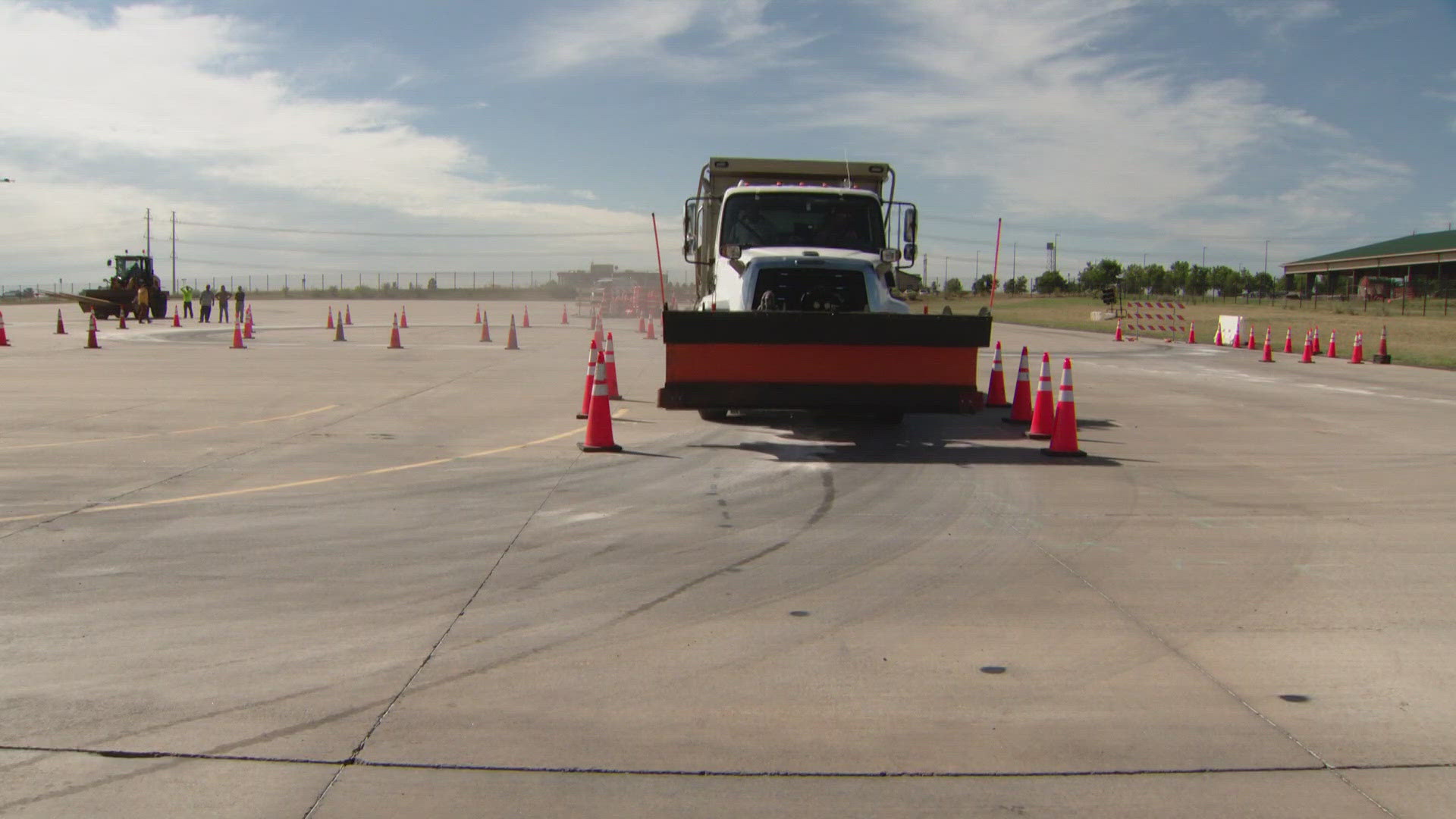 Snowplow drivers are practicing their skills before the first snowfall.