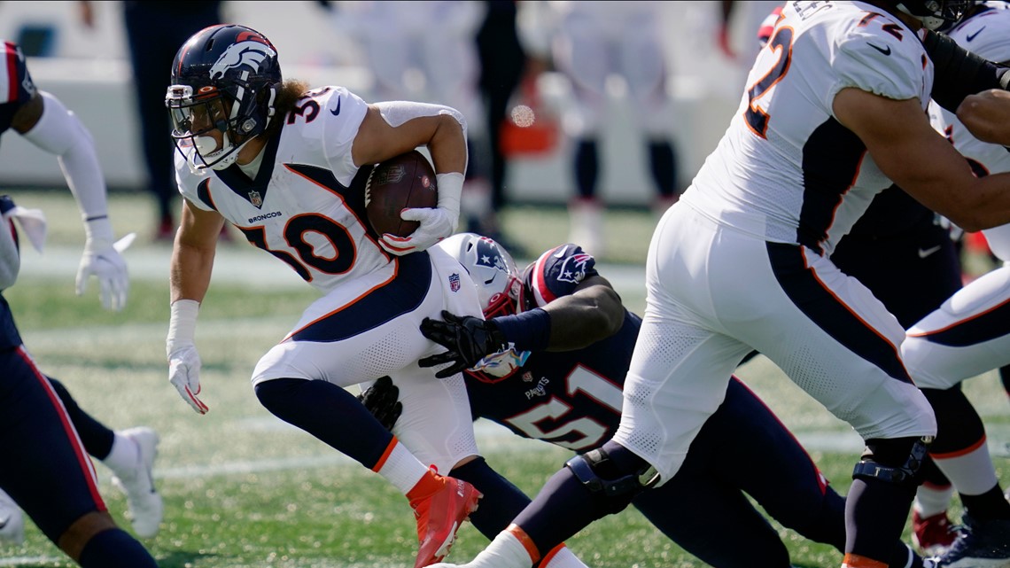 Denver Broncos running back Phillip Lindsay (30) takes part in drills  during the opening day of the team's NFL football training camp Thursday,  July 18, 2019, in Englewood, Colo. (AP Photo/David Zalubowski