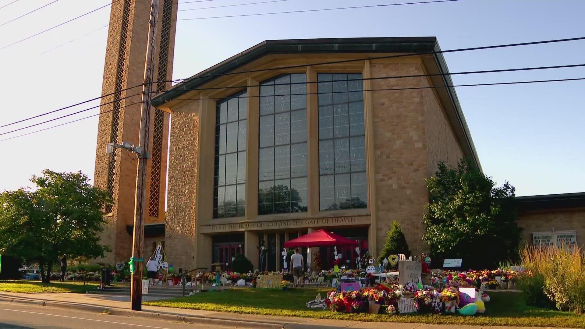 Two students were killed and dozens were injured when a shooter opened from the street outside Annunciation Catholic Church on Wednesday.