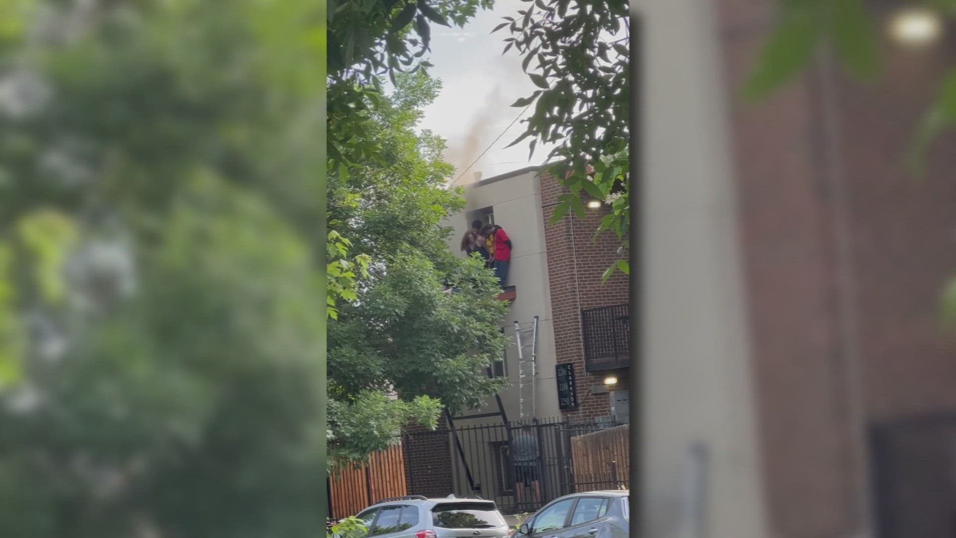 Adam Steinbach, who lives across the street from the building, said he used a ladder to begin rescuing people from a second-story awning before firefighters arrived.