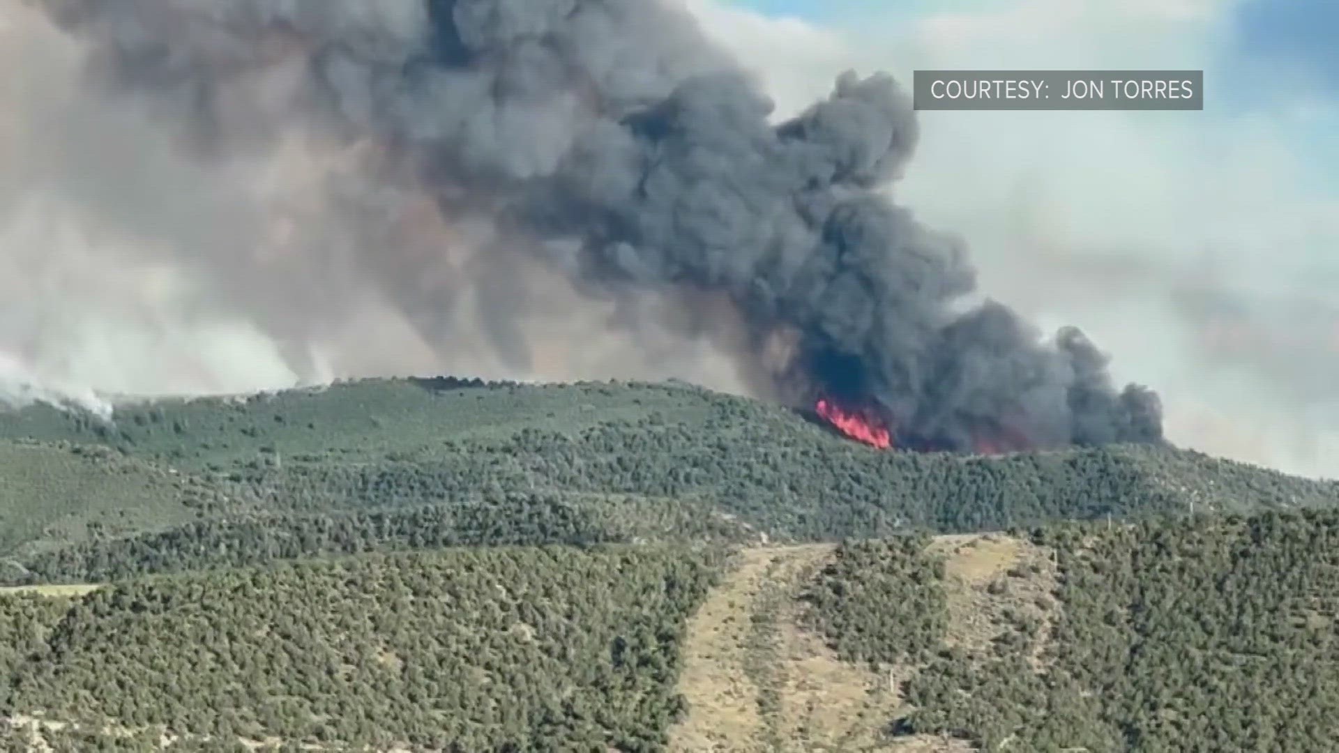 The Spring Creek Fire is burning about five miles southwest of Parachute on the Western Slope of Colorado near Interstate 70.