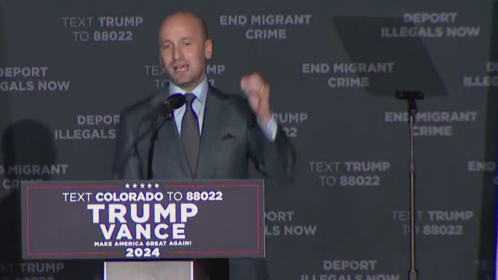 Longtime Trump immigration adviser Stephen Miller spoke before Trump. The crowd cheered as he described making America a country of "only Americans."