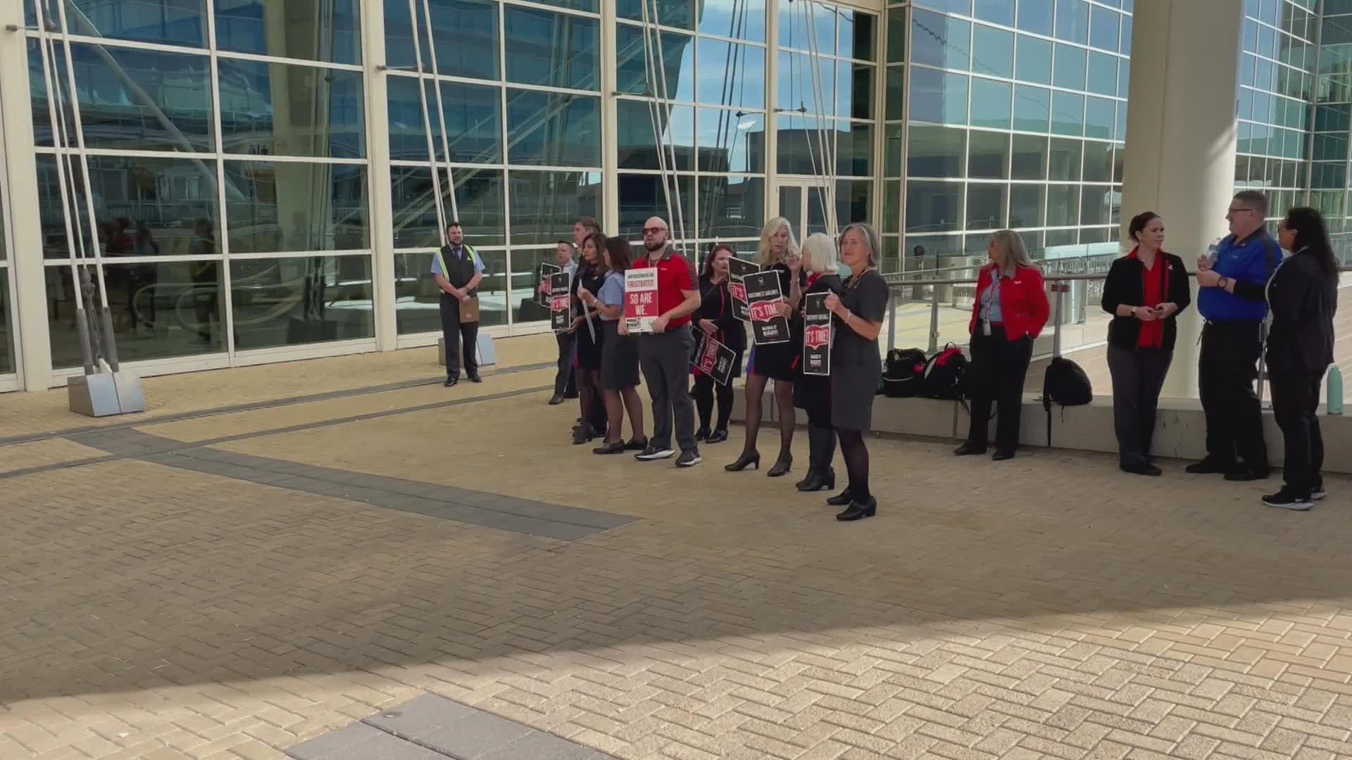 A group of flight attendants is taking a stand at Denver international airport joining with thousands of others across the country to picket against work conditions.