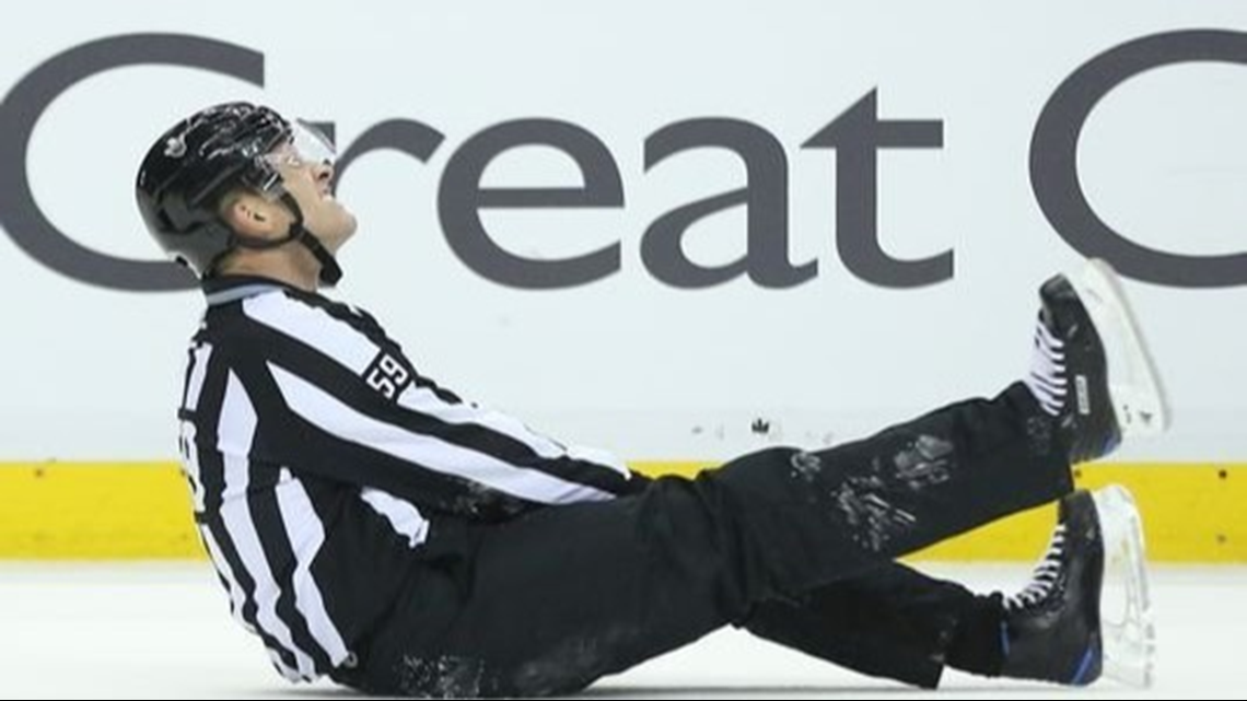NHL ref suffers serious leg injuries during game