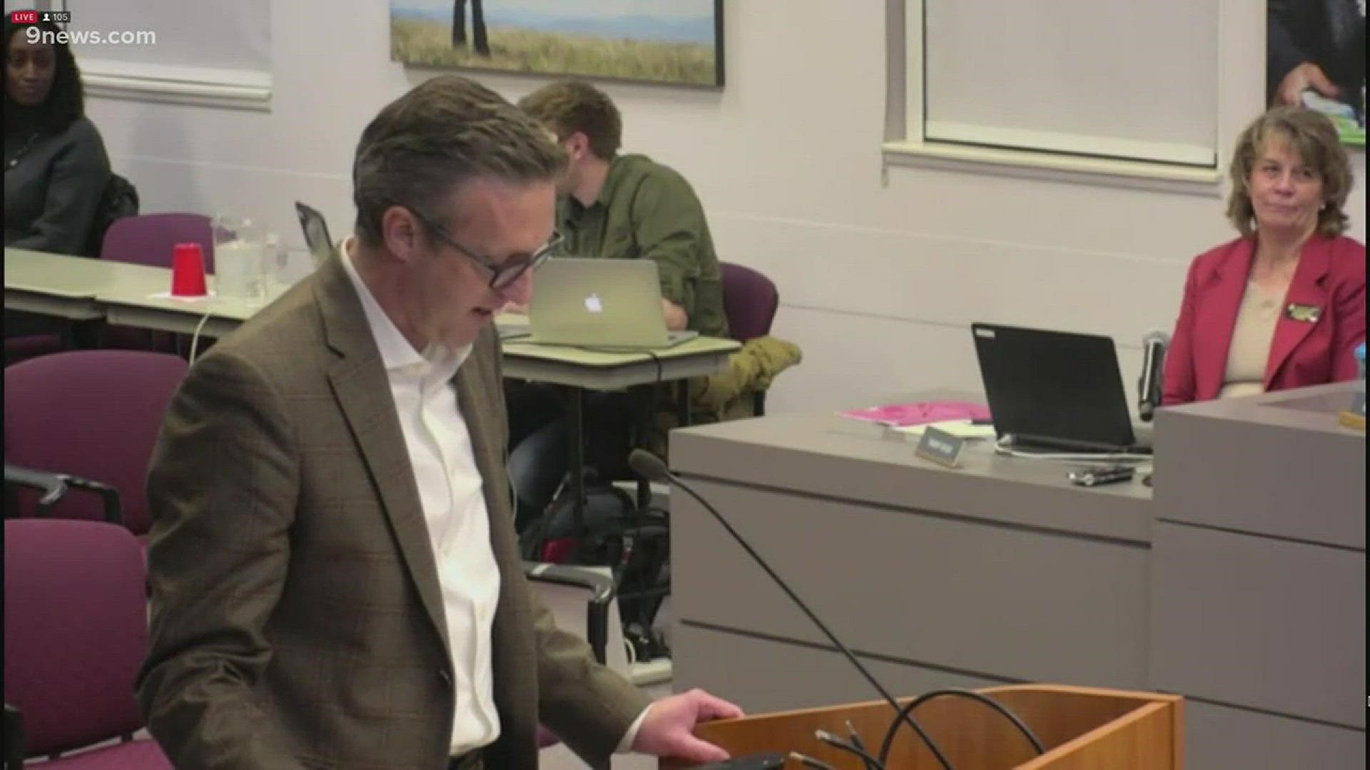 A man attempting to ask the Douglas County School board about Michelle Grissom, the teacher accused of derogatory tweets directed toward a Covington Catholic student, was escorted out of the room.