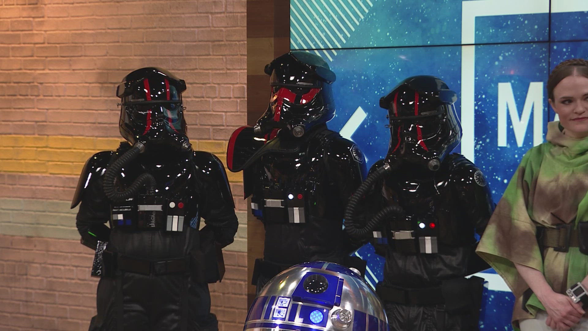 The 501st Legion, a costuming group dedicated to celebrating George Lucas' STAR WARS™, joins 9NEWS's Lauren Scafidi to talk costumes, charity work, and May the 4th.