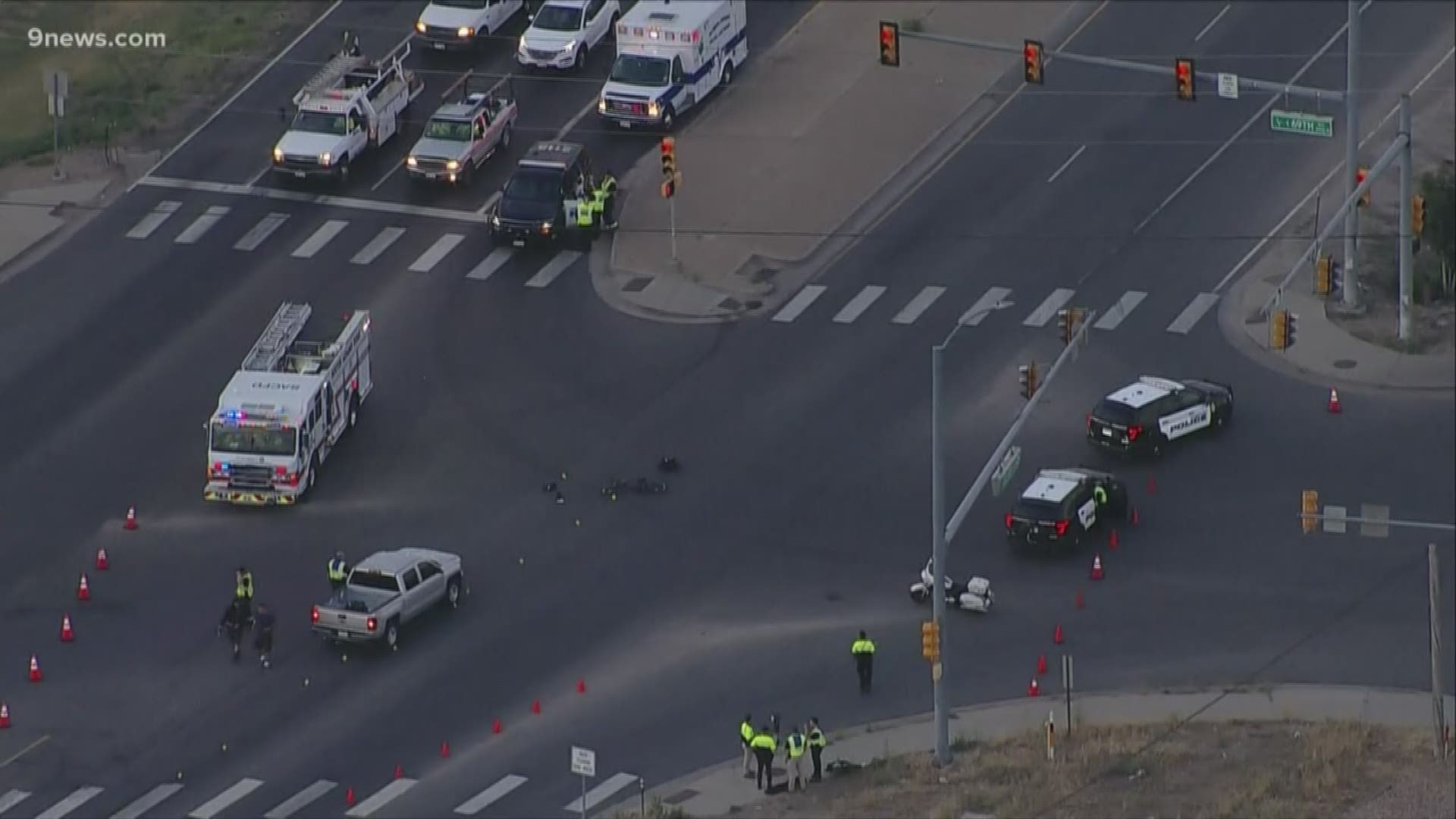 The man was riding his bike through the intersection of Highway 85 and East 69th Avenue when he was hit by the truck, according to police.