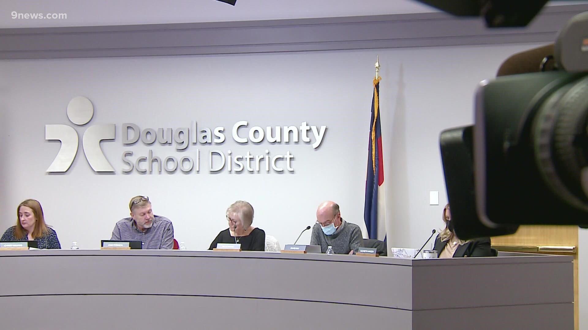A judge issued a preliminary injunction against the board's conservative majority, saying evidence suggests they decided privately to fire the superintendent.