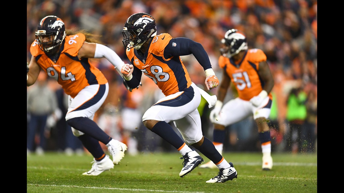 Denver Broncos outside linebacker Bradley Chubb raises his arms to the  crowd during an NFL football game between the Denver Broncos and the  Chicago Bears, Sunday, Sept. 15, 2019, in Denver. (AP