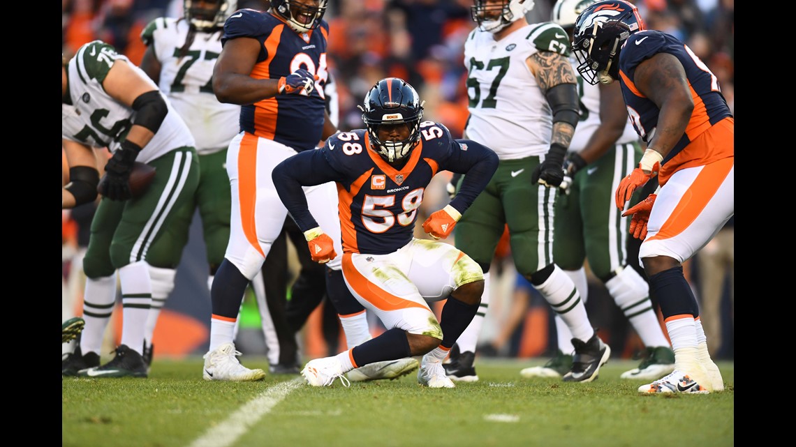 Denver Broncos outside linebacker Bradley Chubb raises his arms to the  crowd during an NFL football game between the Denver Broncos and the  Chicago Bears, Sunday, Sept. 15, 2019, in Denver. (AP