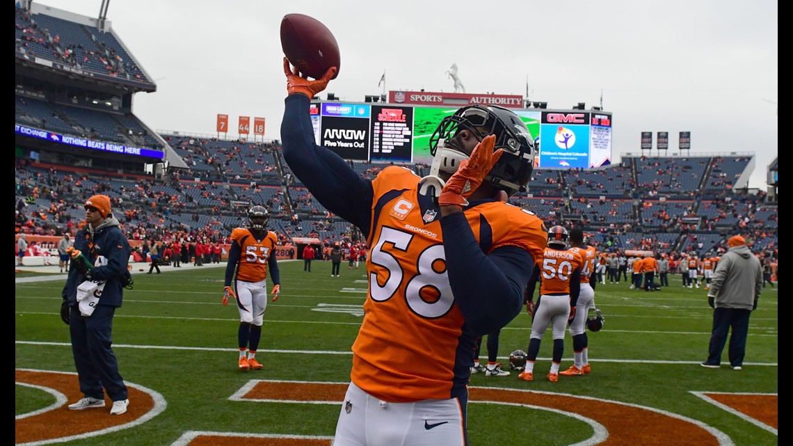 Denver Broncos outside linebacker Bradley Chubb raises his arms to the  crowd during an NFL football game between the Denver Broncos and the  Chicago Bears, Sunday, Sept. 15, 2019, in Denver. (AP