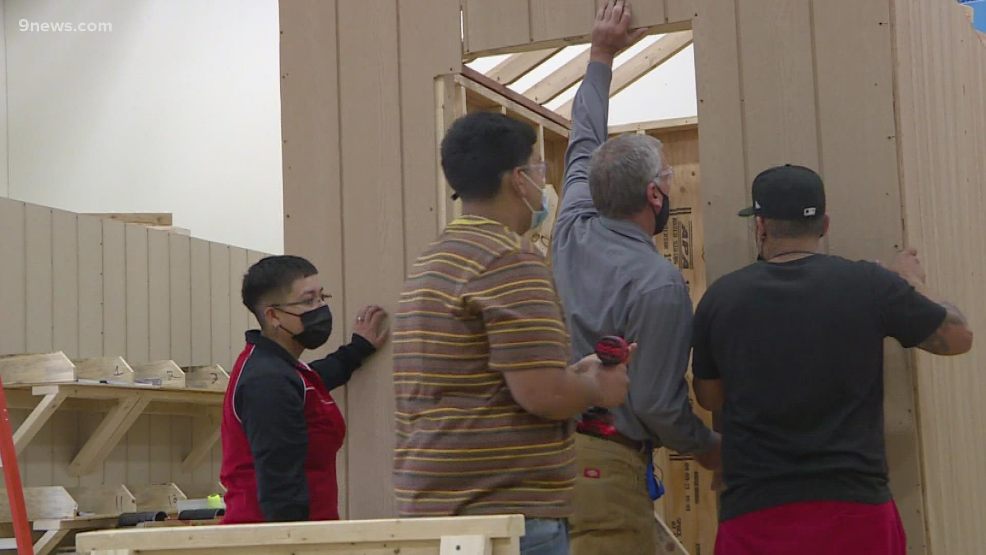 Expansion of high school construction program hopes to get teens certified for construction jobs by the time they graduate.