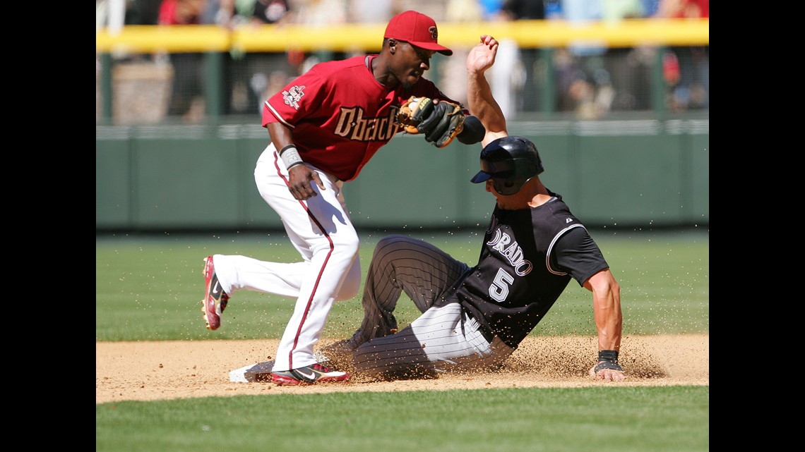 LEADING OFF: Holliday rejoins Rockies, Moreland hurts knee