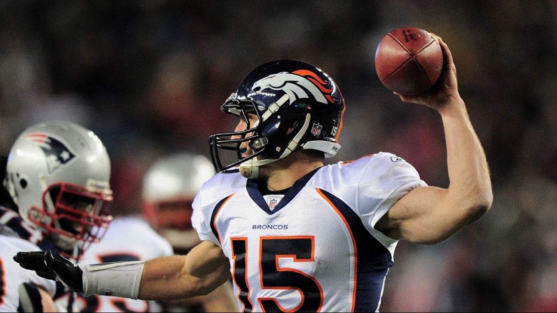 Denver Broncos quarterback Tim Tebow (15) throws a pass in the