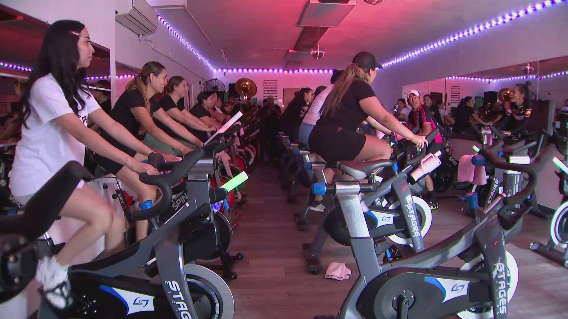 Aurora spin class blends live Banda music and cardio | 9news.com