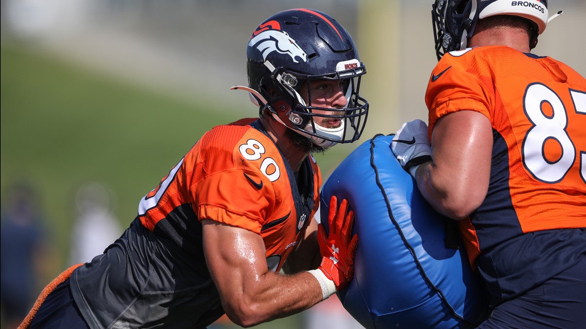 Denver Broncos tight end Jake Butt (80) takes part in drills