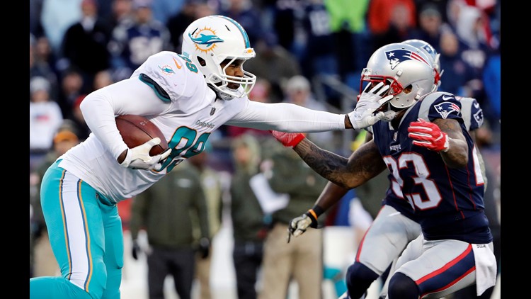 Denver Broncos tight end Julius Thomas (80) watches as the pass