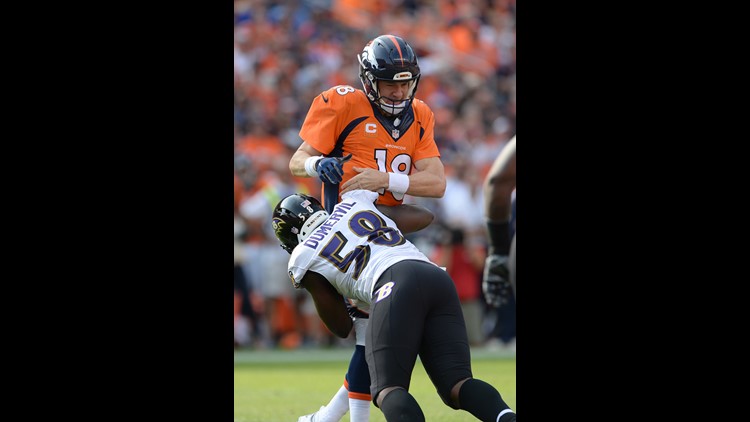 Von Miller (58) enters the field before the first half against the Tampa  Bay Buccaneers at Sports Au…