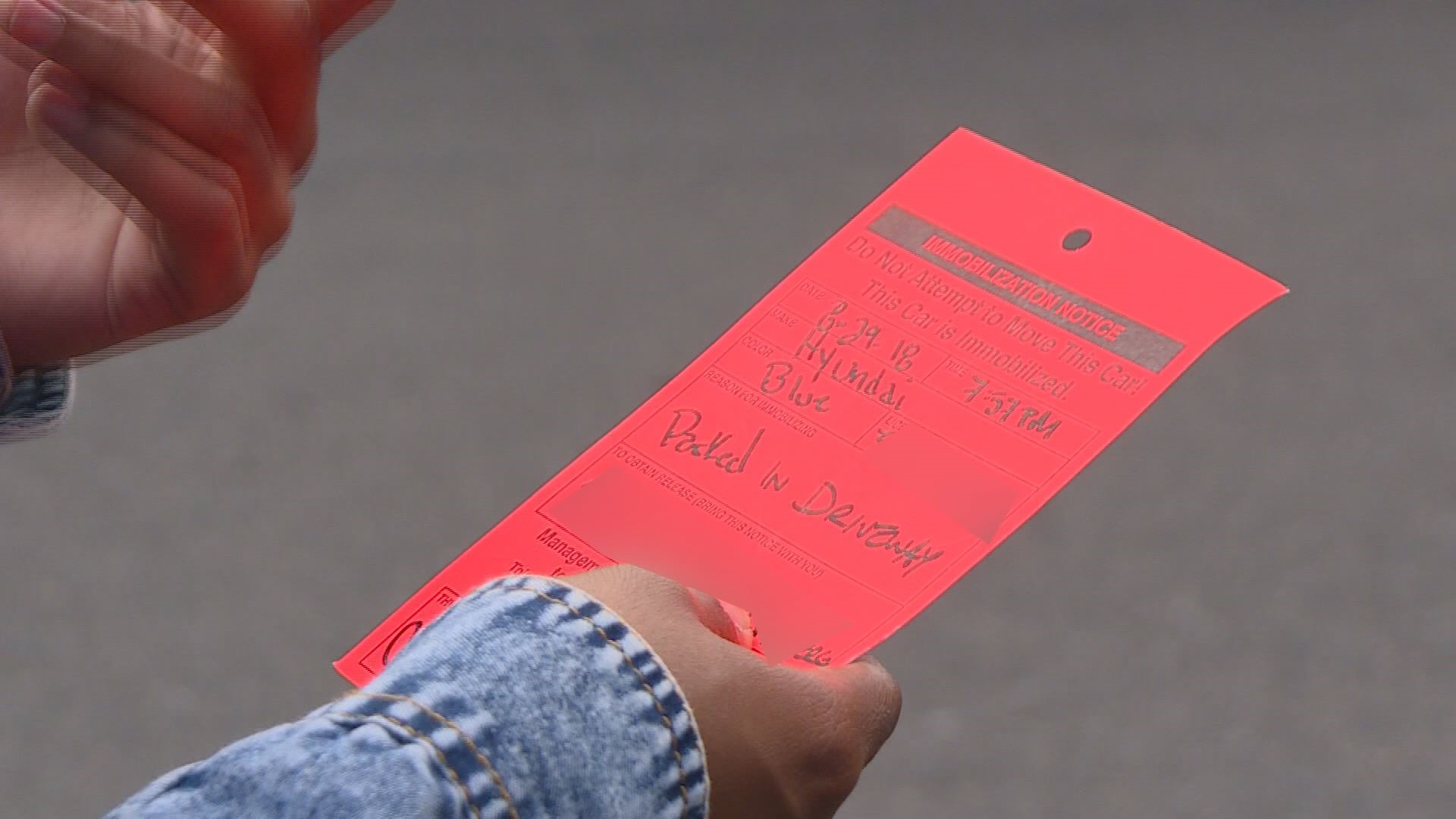 Denver guy boots car in front of his house. In related news, it's