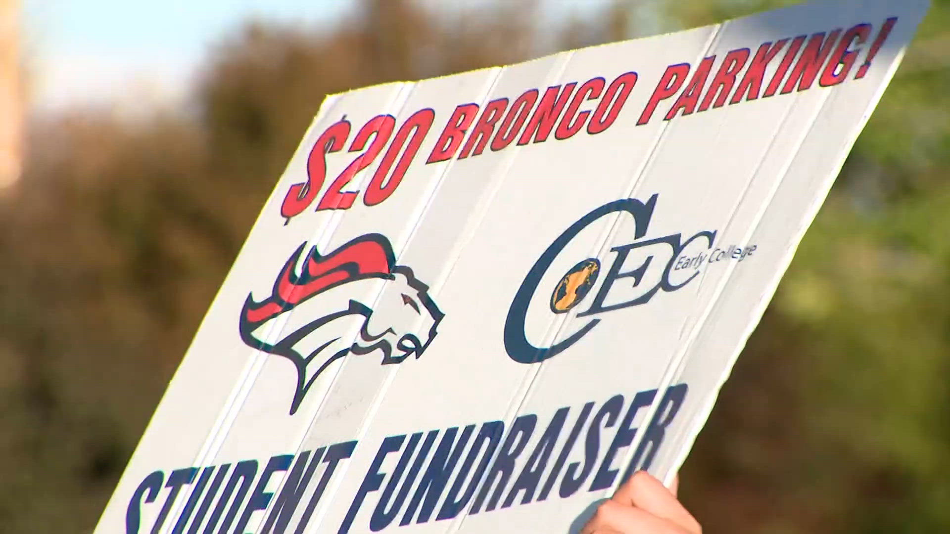 Broncos game day parking funds student organizations | 9news.com