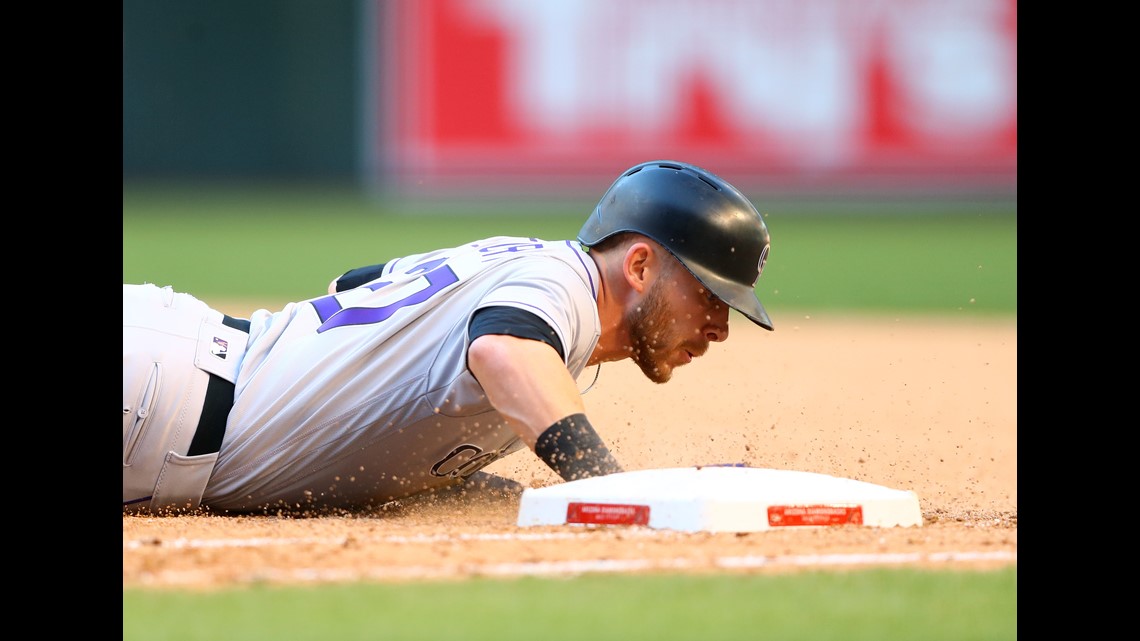 Rockies' Trevor Story on hold with elbow injury; game vs. Pirates rained out